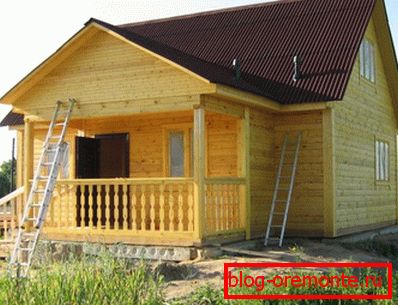 Na zdjęciu - dom z poddaszem z baru 9x9 Na zdjęciu - dom z poddaszem z baru 9x9