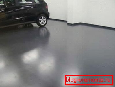 Na zdjęciu - parking, betonowa posadzka, która została profesjonalnie pokryta środkami polimerowymi Na zdjęciu - parking, betonowa posadzka, która została profesjonalnie pokryta środkami polimerowymi